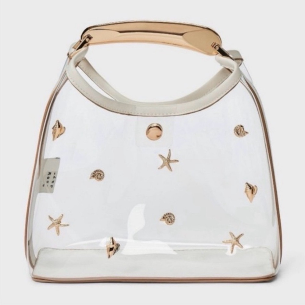 a new day Clear Tote with Gold Sea Charm Accents and Cream Handles